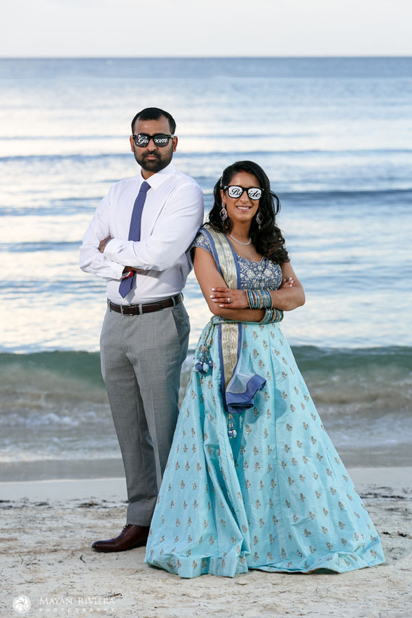 HinduNewlywedsPoseOnBeachWithSunglasses