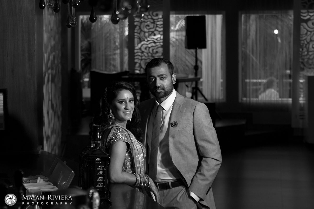 HinduNewlywedsPoseInLounge