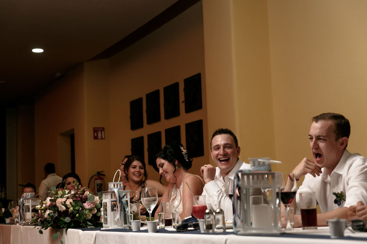 BarceloNewlywedsLaughingAtHeadTable