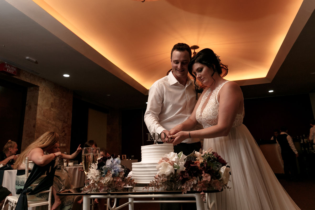 NewlywedsCuttingCake