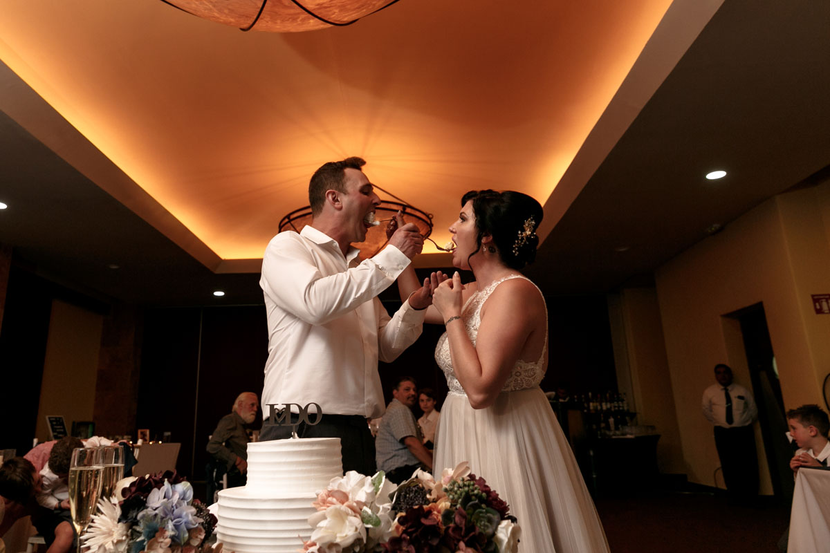 NewlywedsSharingCake