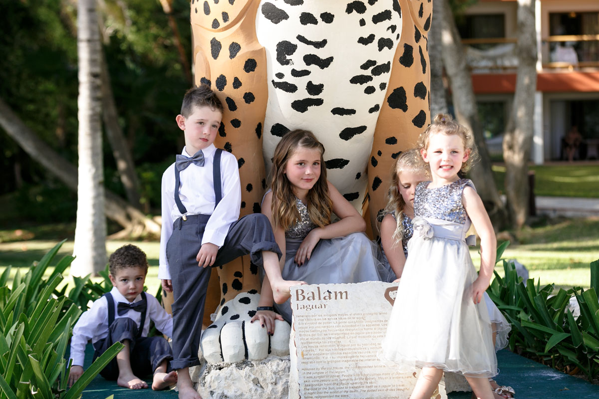 BarceloWeddingKidsPlayOnTigerSculpture