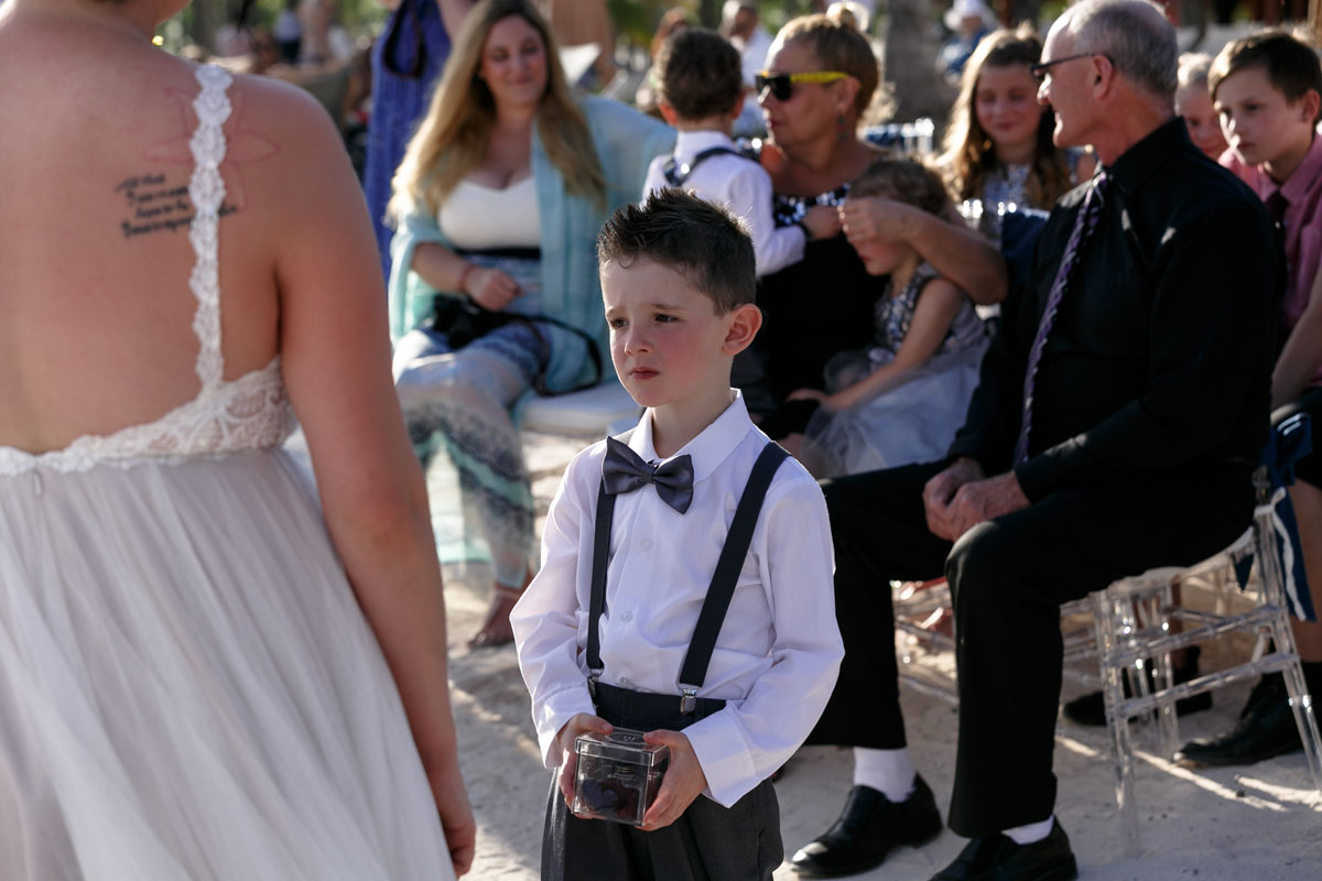 ConcernedRingBearerDeliversRings