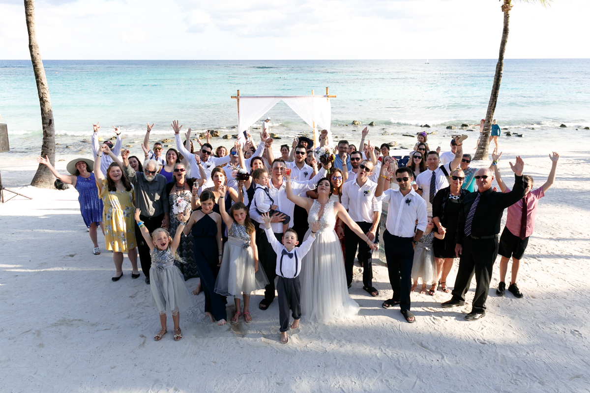 GuestsCongratulateNewlywedsInDroneShot