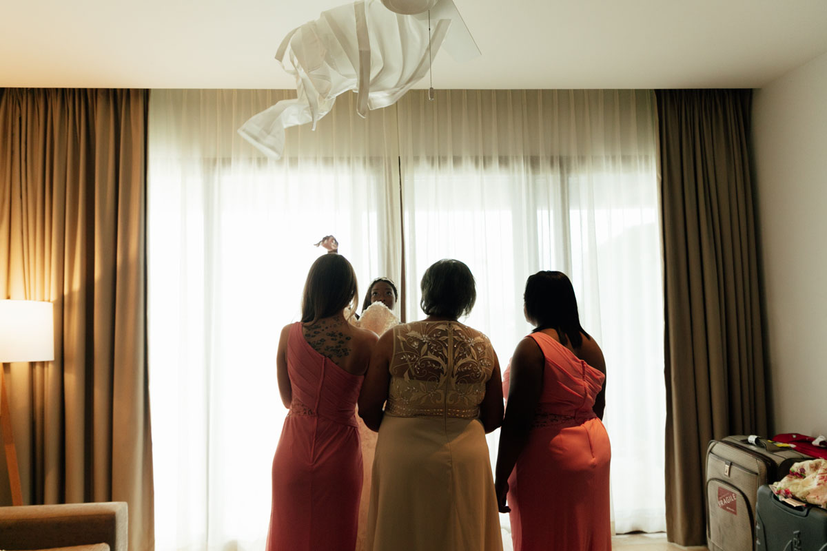 BrideGettingDressedTossesRobe