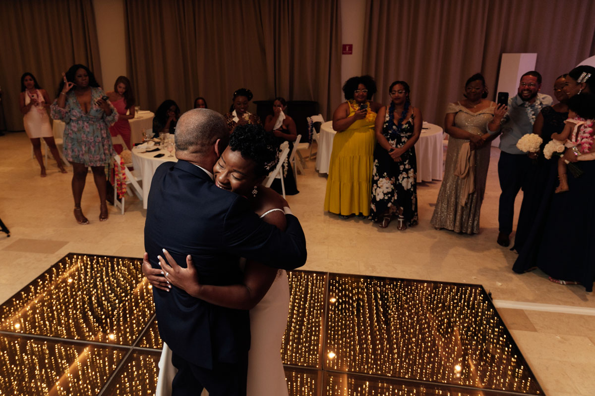 DreamsPlayaMujeresBrideEmbracesDad