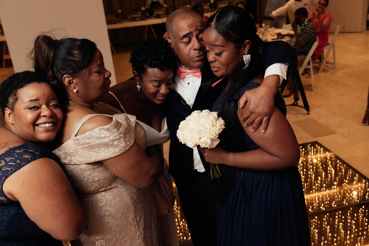 DreamsPlayaMujeresBrideEmbracesFamily