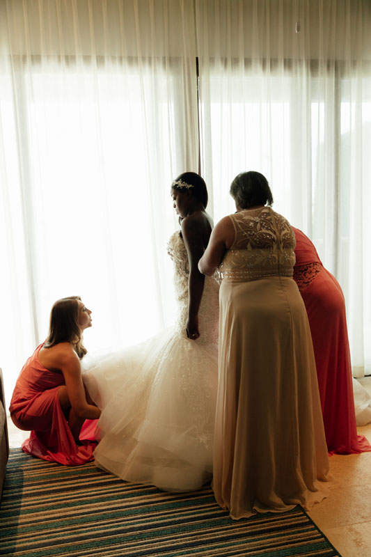 BrideGettingDressedWithBesties