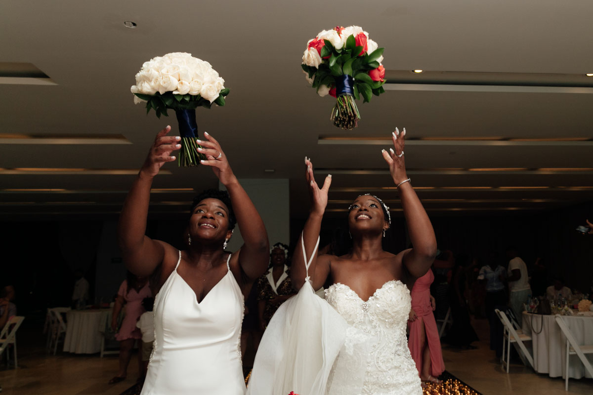 NewlywedsTossTheirBouquets