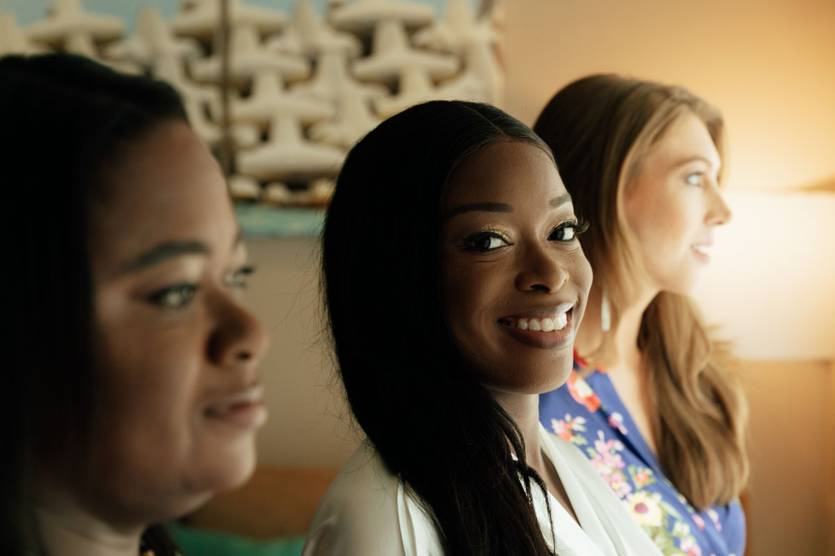 SmilingBrideWithBridesmaids