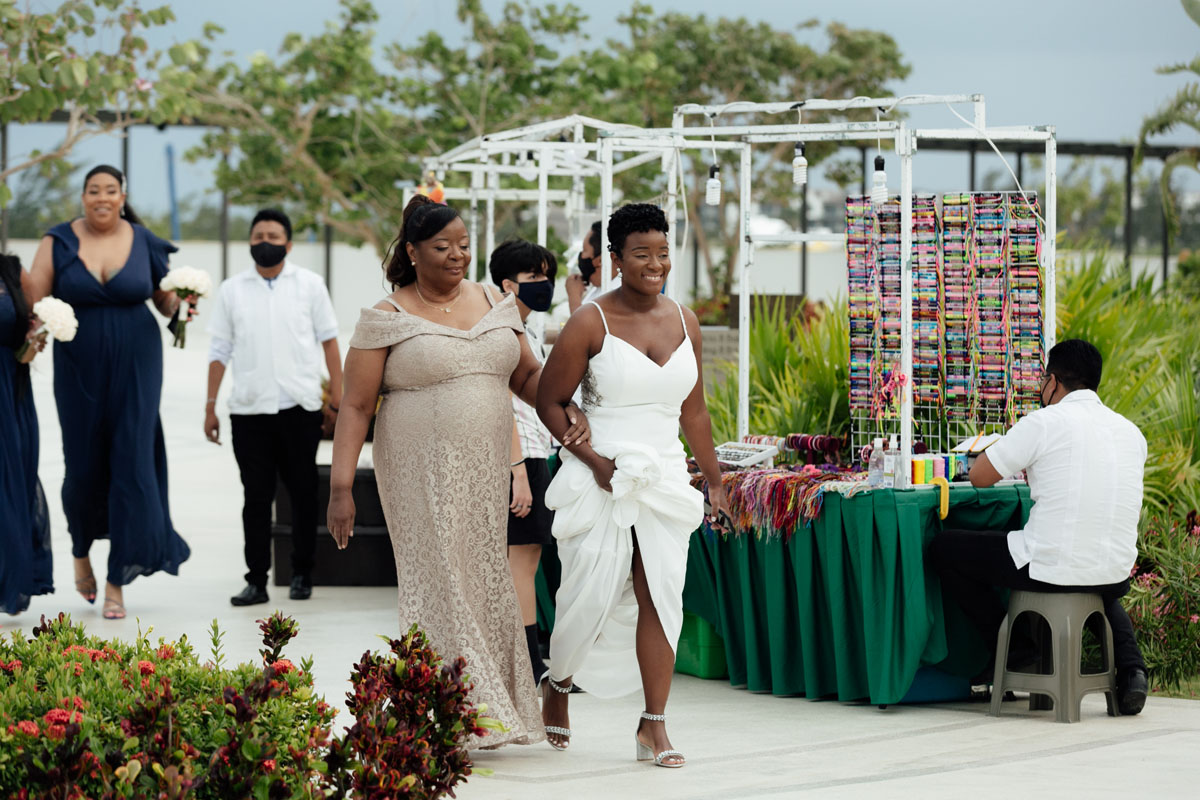 DreamsPlayaMujeresBrideWalkingToCeremony