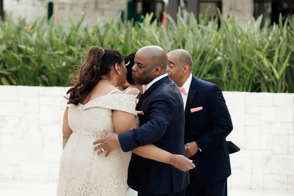 DreamsPlayaMujeresBridalEntourageGettingHugs