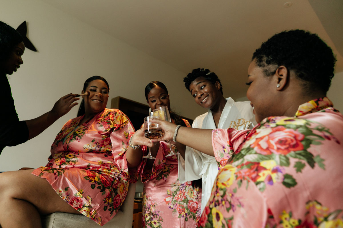 DreamsPlayaMujeresBrideAndBestiesClinkingGlasses