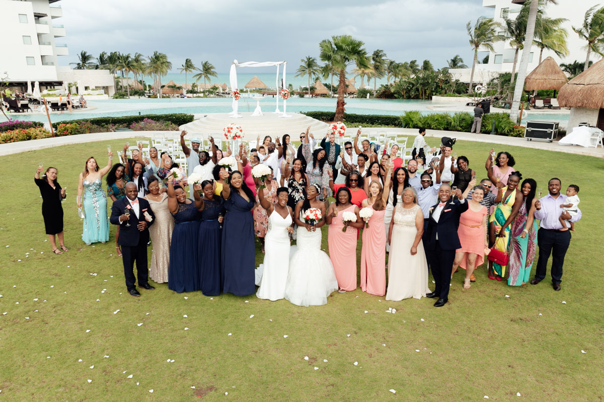 WeddingPartyAndGuestsCheerInDroneShot