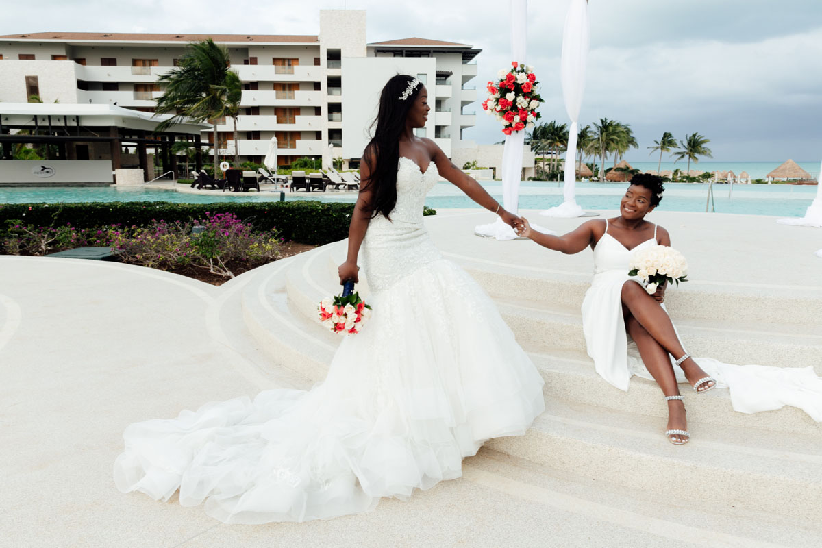 NewlywedsPoseOnPodium