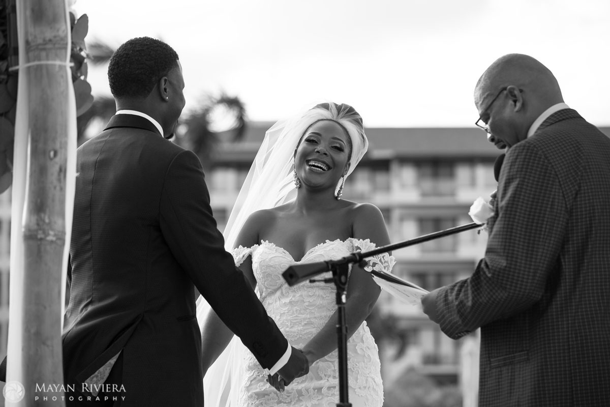 LaughingWeddingCoupleAtCeremony