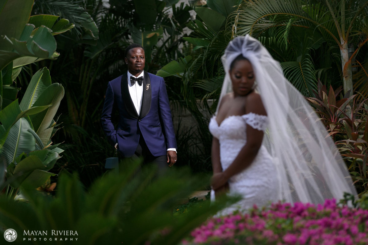 NewlywedsPoseInJungleGarden