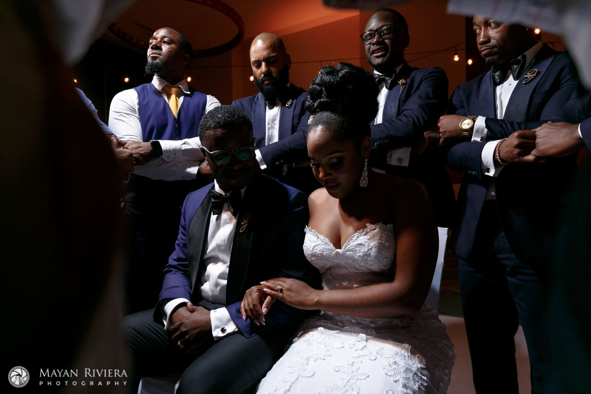 GroomsmenHoldHandsCirclingNewlyweds