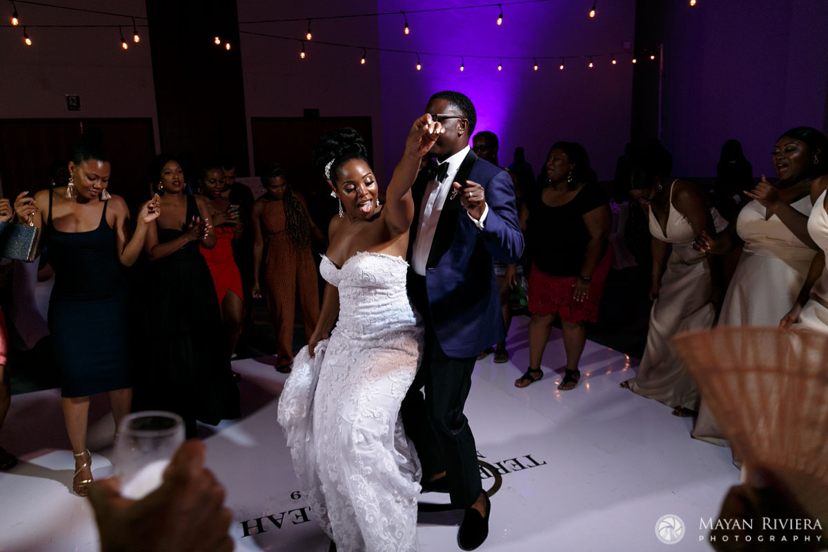 NewlywedsDanceSurroundedByGuests