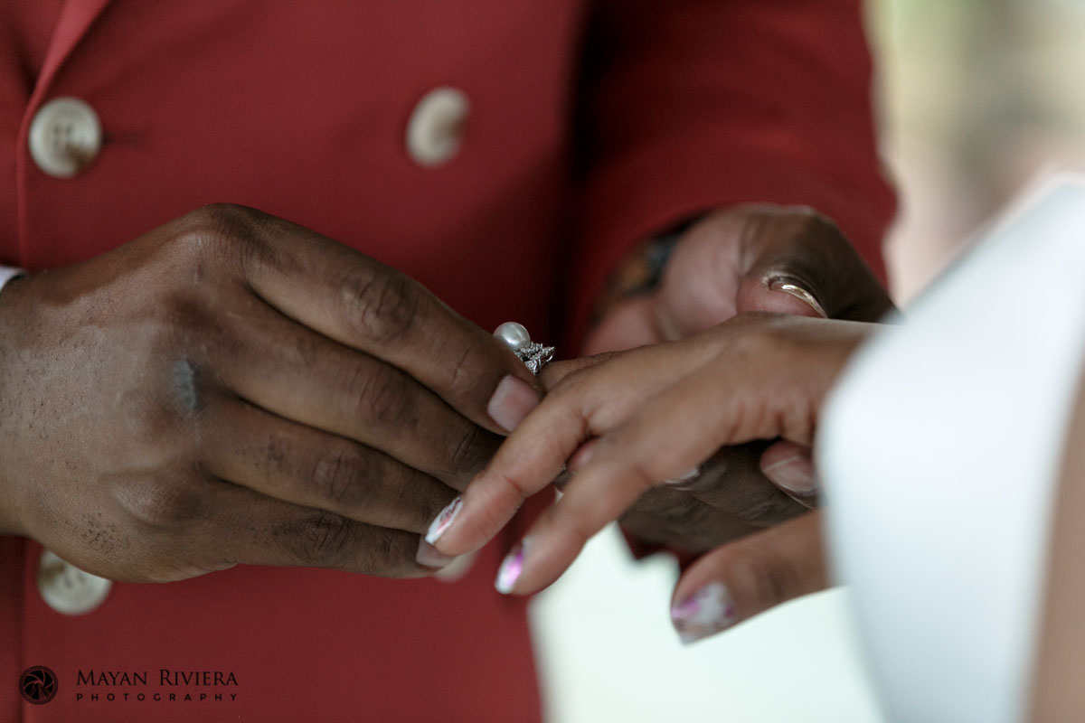 GroomPutsARingOnBride