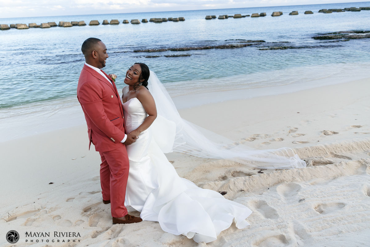 NewlywedsPoseOnBeach