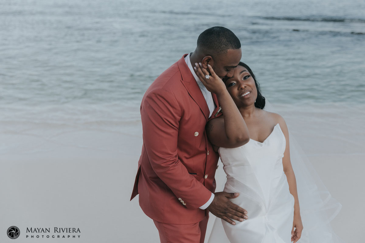 NewlywedsPoseOnBeach