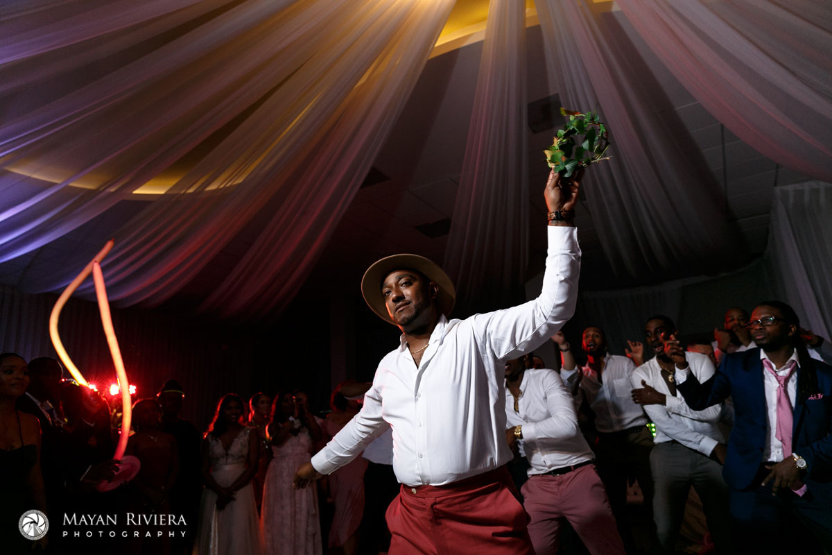 GroomTossesGarterToTheGuys