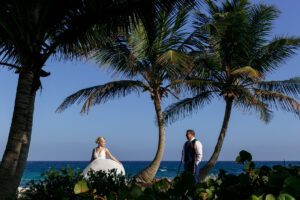 NewlywedsOnBeachStroll
