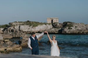 NewlywedsDanceOnBeach