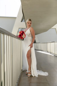 SmilingBrideLiftsGown