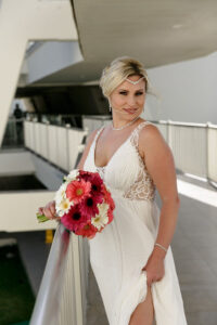 SmilingBrideLiftsGown