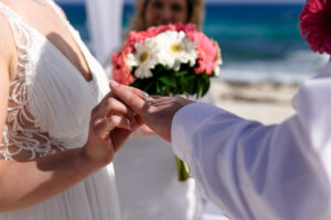 BrideSlidesRingOnGroom