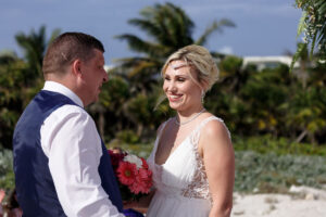 NewlywedsSmilingAtEachOther