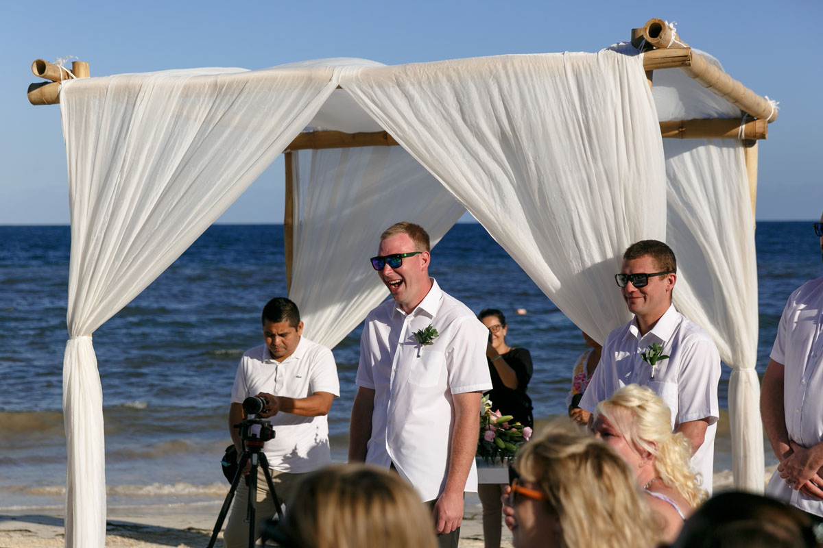 LaughingGroomAwaitsBridesArrival