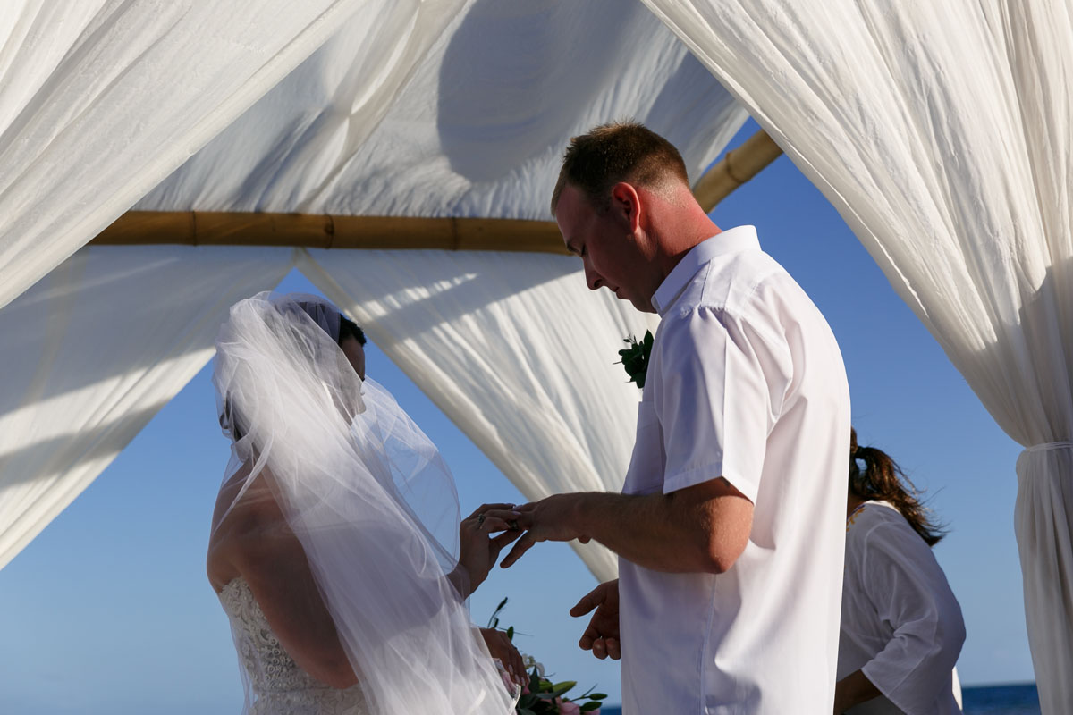 NowSapphireBridePutsRingOnGroom