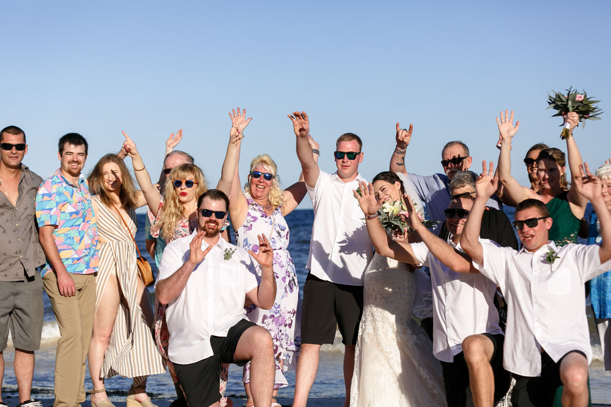 CheeringGuestsCongratulateNewlyweds