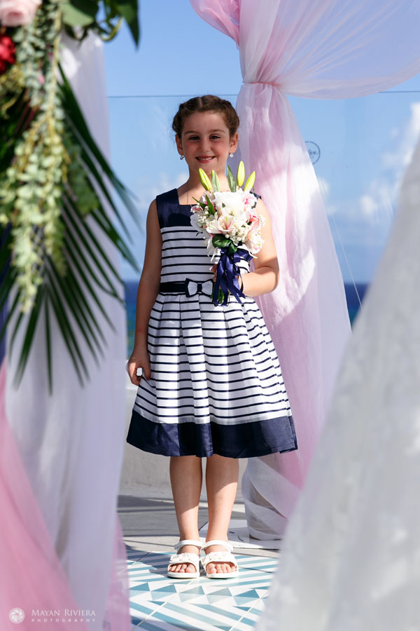 BeamingFlowerGirlEmmaAtCeremony