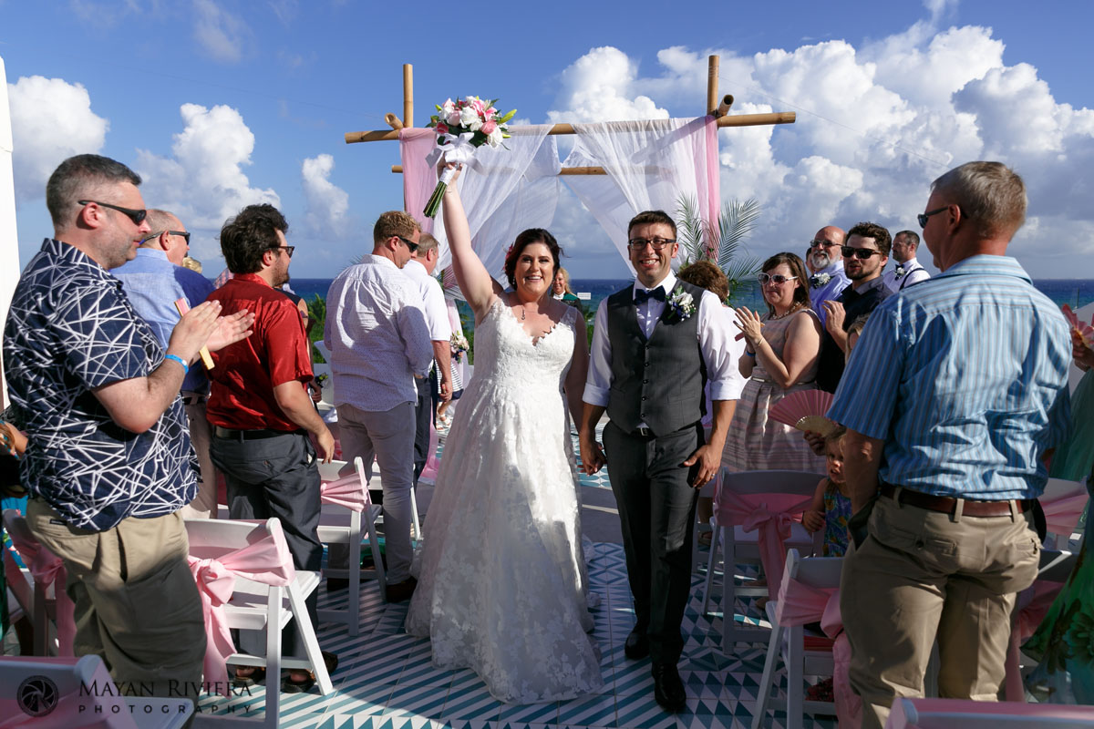 CheeringNewlywedsWalkOut