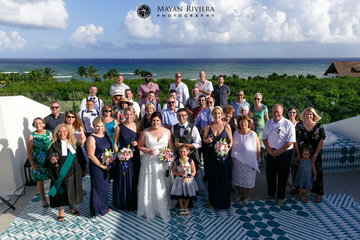 GuestsPoseWithNewlywedsInDroneShot