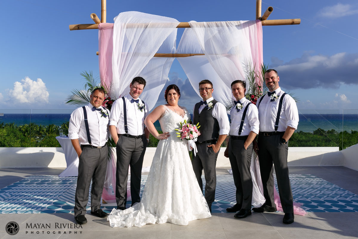 NewlywedsPoseWithGroomsmen