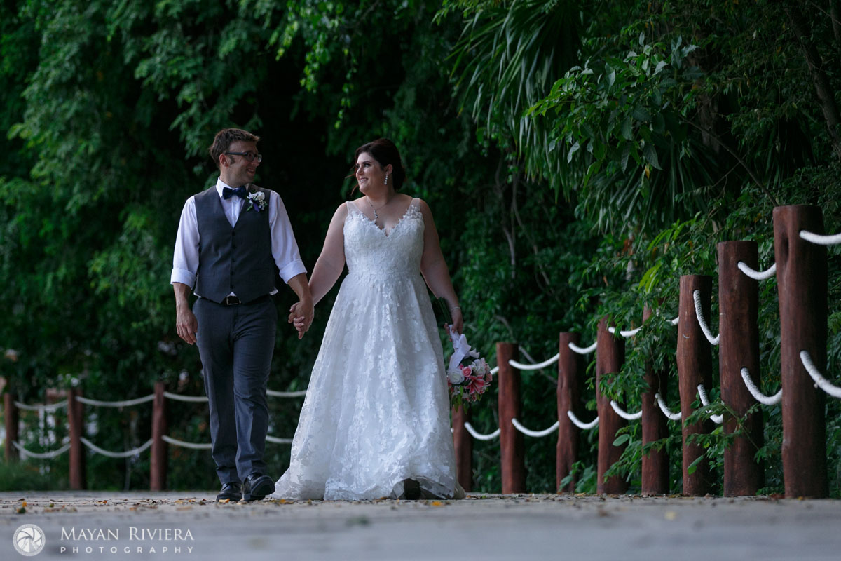 NewlywedsStrollGardenPath