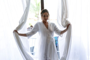 ORPBrideMichelleThrowingOpenCurtains