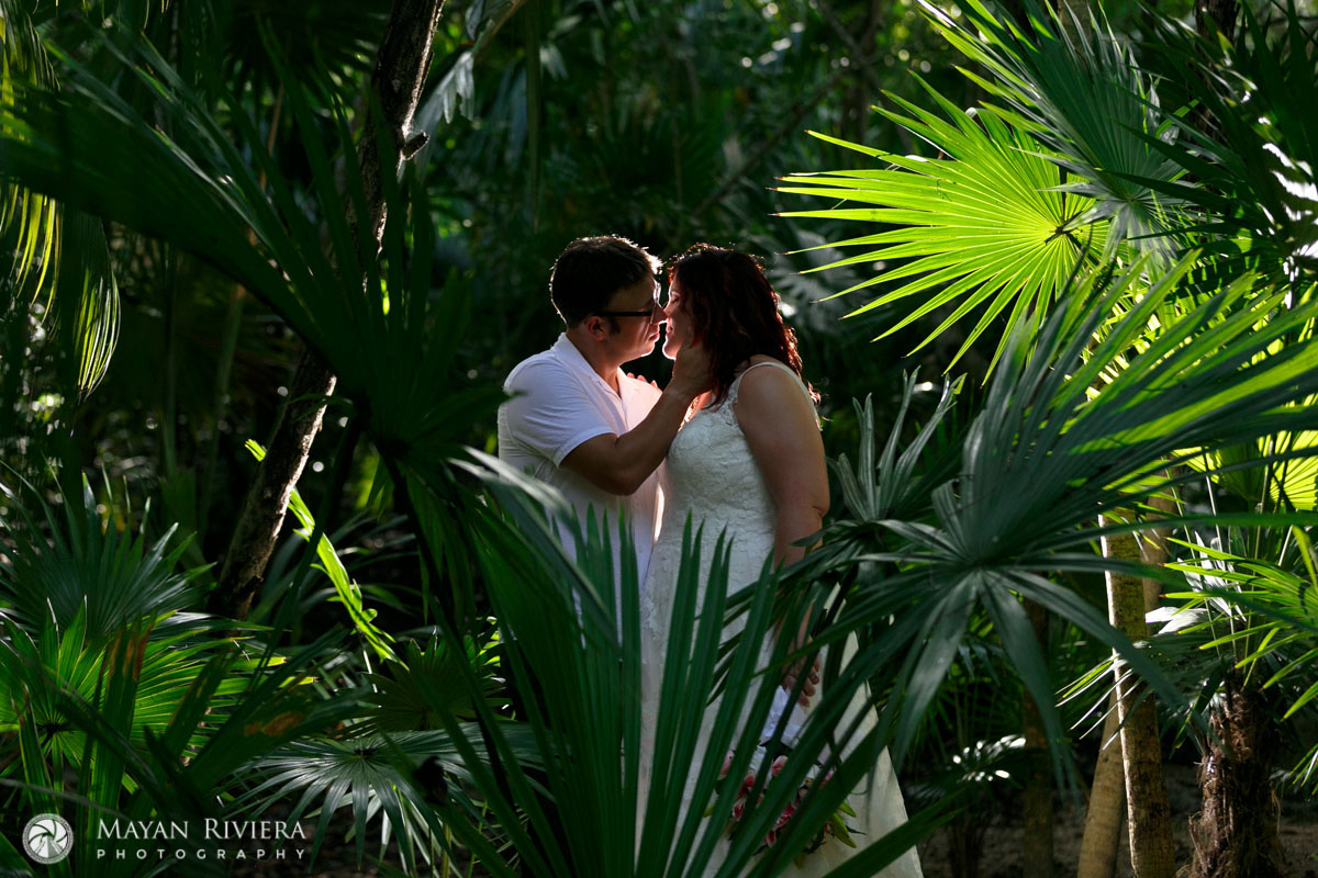 NewlywedsEmbraceOnJunglePath