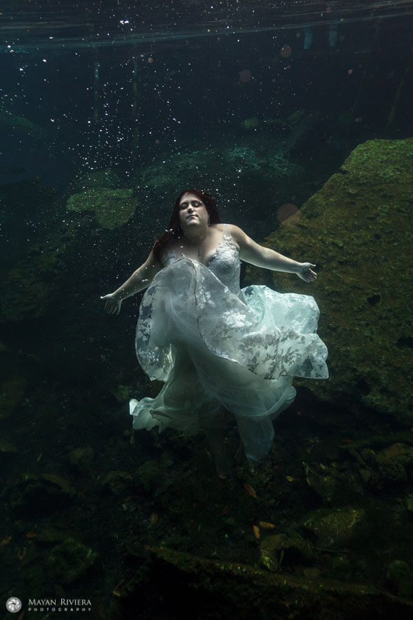 ORPBrideTeriFloatsUnderwaterInCenote