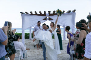 NewlywedsCheeringAfterCeremony