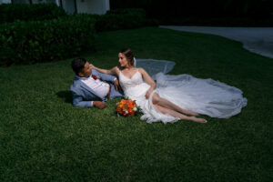 NewlywedsReclineOnLawn