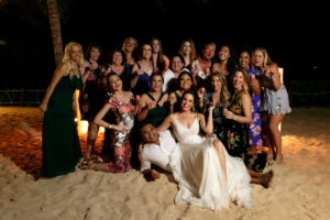 NewlywedsPoseWithLadyGuests