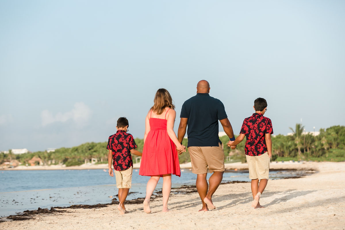 RyannAndFamilyOnBeachWalkAtPuntaEsmeralda