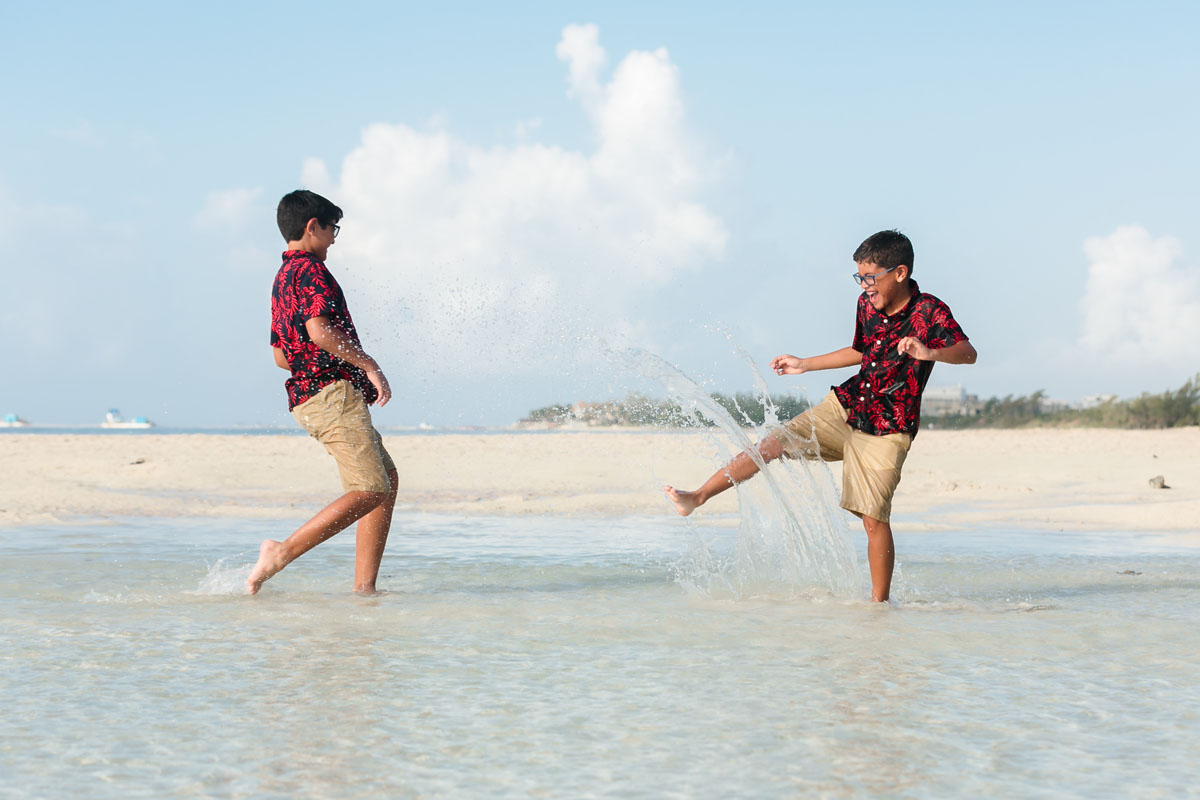 LaughingBoysSplashWaterAtEachOtherInTidePool