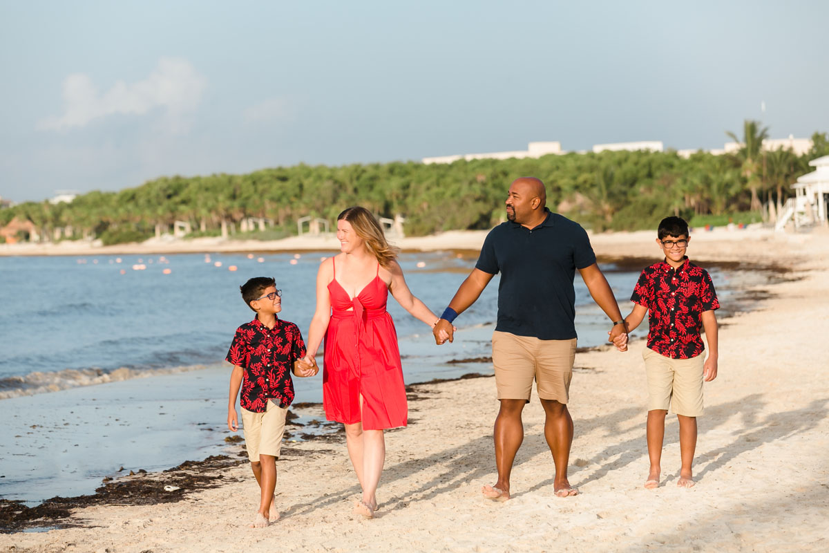 RyannAndFamilyOnBeachWalkAtPuntaEsmeralda